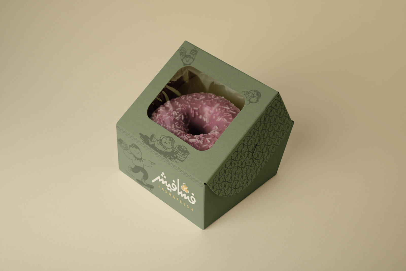 Olive single-donut window box showing a pink sprinkled donut inside